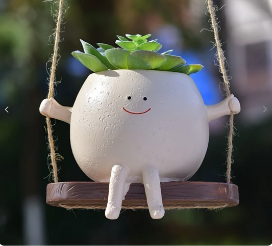 Swing planter